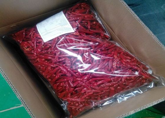 Les cosses rouges de piments de MUI Tianjin Red Chilies Authentic choisissent l'herbe